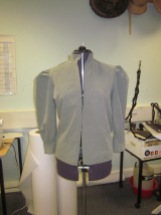 shirt, front, back and sleeves attached. Front overlocked ready for buttons and button holes